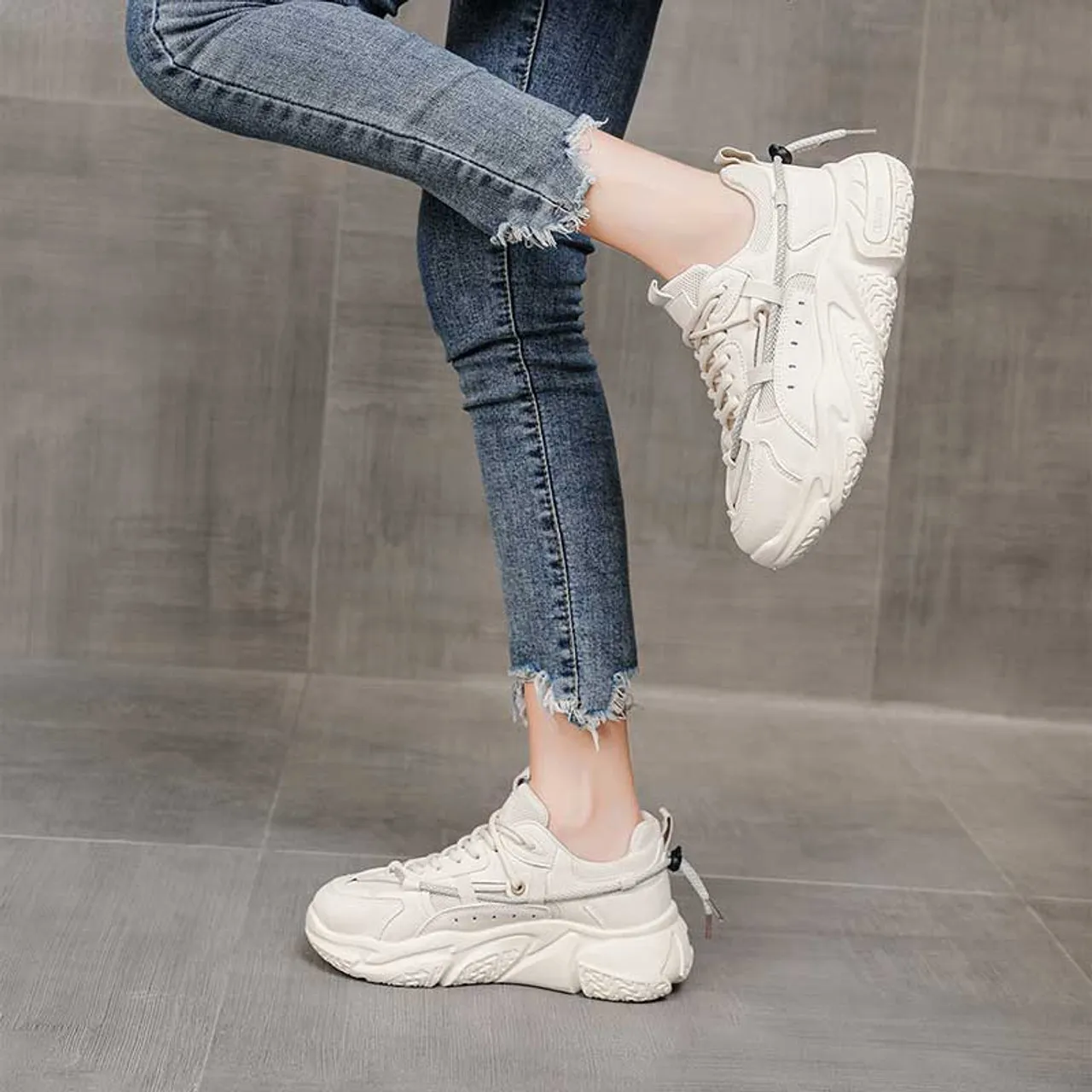 Beige rear lace accents thick sole shoe sneaker